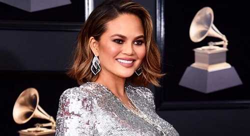 Chrissy Teigen dishes to ‘Ellen’ about Trump twitter feud - theGrio