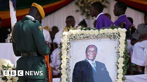 Mugabe finally buried in his home village