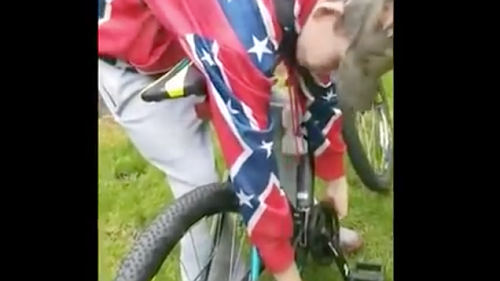 Video Shows Black Woman Chasing Confederate Flag-Wearing Teen Who Called Her the N-Word