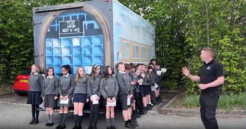 Mobile prison cells show students what life behind bars is like